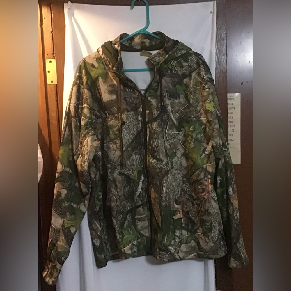 Red Head:  Mens Hunters camo design outdoor heavy jacket size extra large.